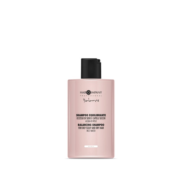 Hair Company UK The 0103 shampoo, designed for dry hair with an oily scalp, comes in a pink bottle featuring bilingual text in Italian and English and is equipped with a practical black flip-top cap.