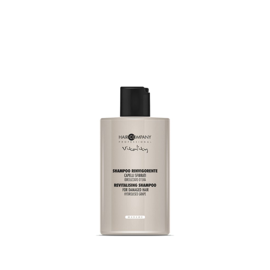 Hair Company UK A bottle of Hair Company Professional 0107 Revitalizing Hair Shampoo for damaged hair, featuring a neutral-toned label and a sleek black cap.