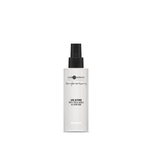 Hair Company UK A sleek white bottle of the 0110 hair spray from Hair Company Professional, featuring a black nozzle and minimalist text design. The LISS formula provides benefits for smooth and manageable hair.