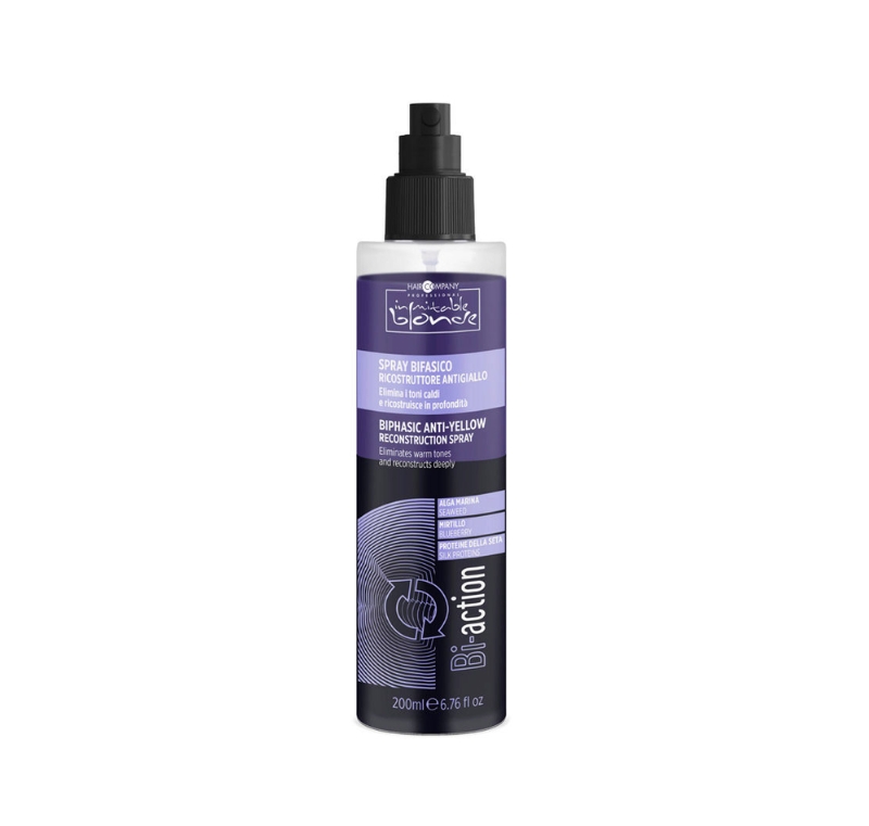 Hair Company UK A 200ml bottle of the BIPHASIC ANTI-YELLOW RECONSTRUCTION SPRAY by Bifendre, featuring a black pump dispenser and a striking purple label. This dual-phase formula is designed to neutralize unwanted yellow tones in hair, enriching and revitalizing it for naturally luminous results.