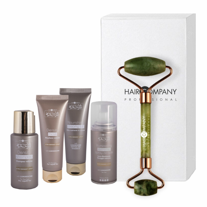 Hair Company UK The "obemmaxi-700x700" set includes four travel-size skincare items and a jade facial roller, elegantly contained in stylish packaging, all neatly arranged in a white box labeled "Hair Company Professional".